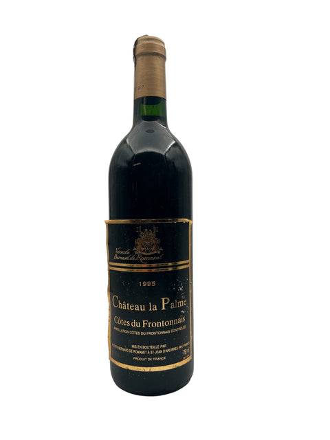 Flaska Château la Palme rött vin 1995 från Frankrike
