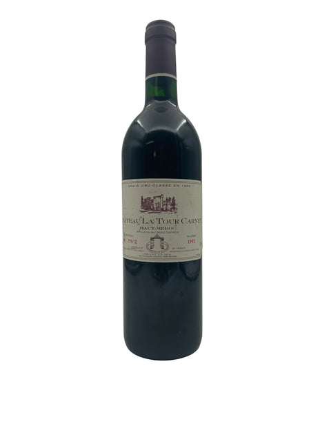 Flaska Château La Tour Carnet rött vin 1999