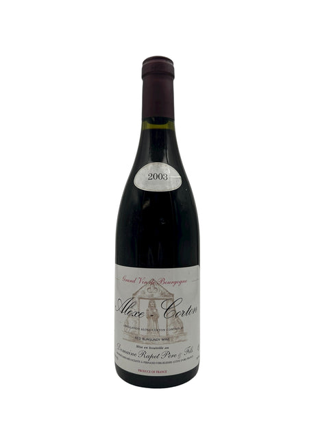 Flaska Aloxe Corton Domaine Rapet rött vin från 2003 med etikett