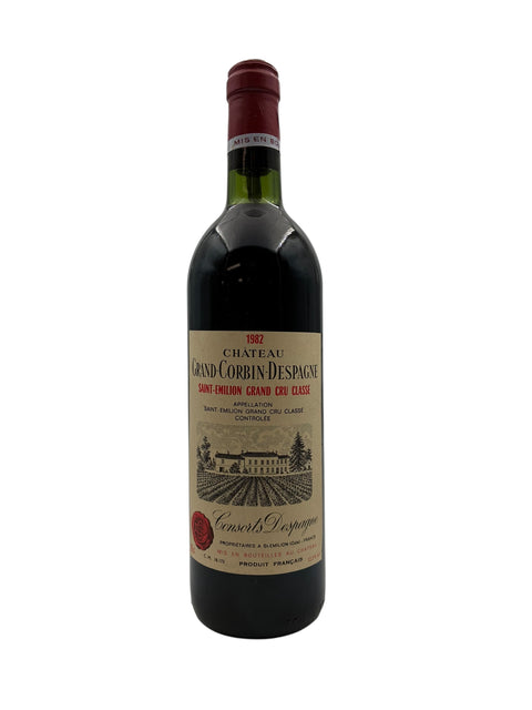 Flaska Château Grand Corbin Despagne 1982 med etikett