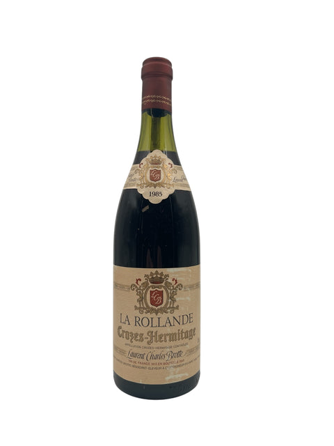 Flaska rödvin La Rollande från 1985 av Laurent Charles Brotte