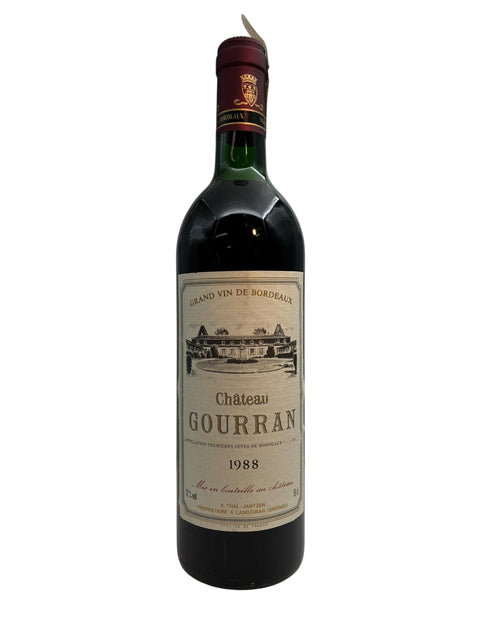 Flaska Chateau Gourran rött vin 1988 med etikett