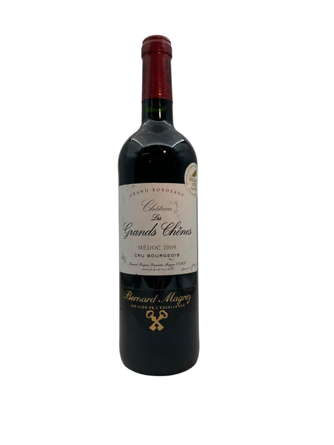 Flaska Château Les Grands Chênes 2009 rött vin