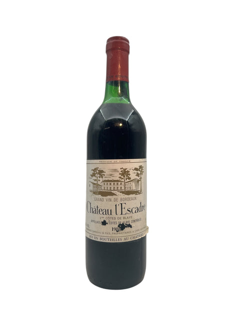 Flaska Château l'Escadre 1988 rött vin med etikett