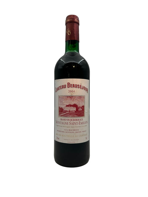 Flaska rött vin från Chateau Beauséjour 2004