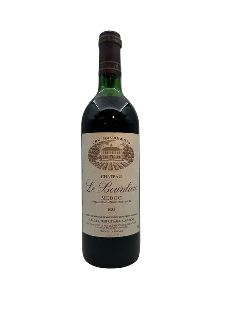 Flaska Médoc Chateau Le Bourdieu rött vin 1983